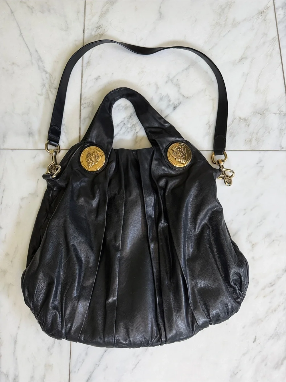 Gucci Black Leather Hobo Bag with Gold Medallions